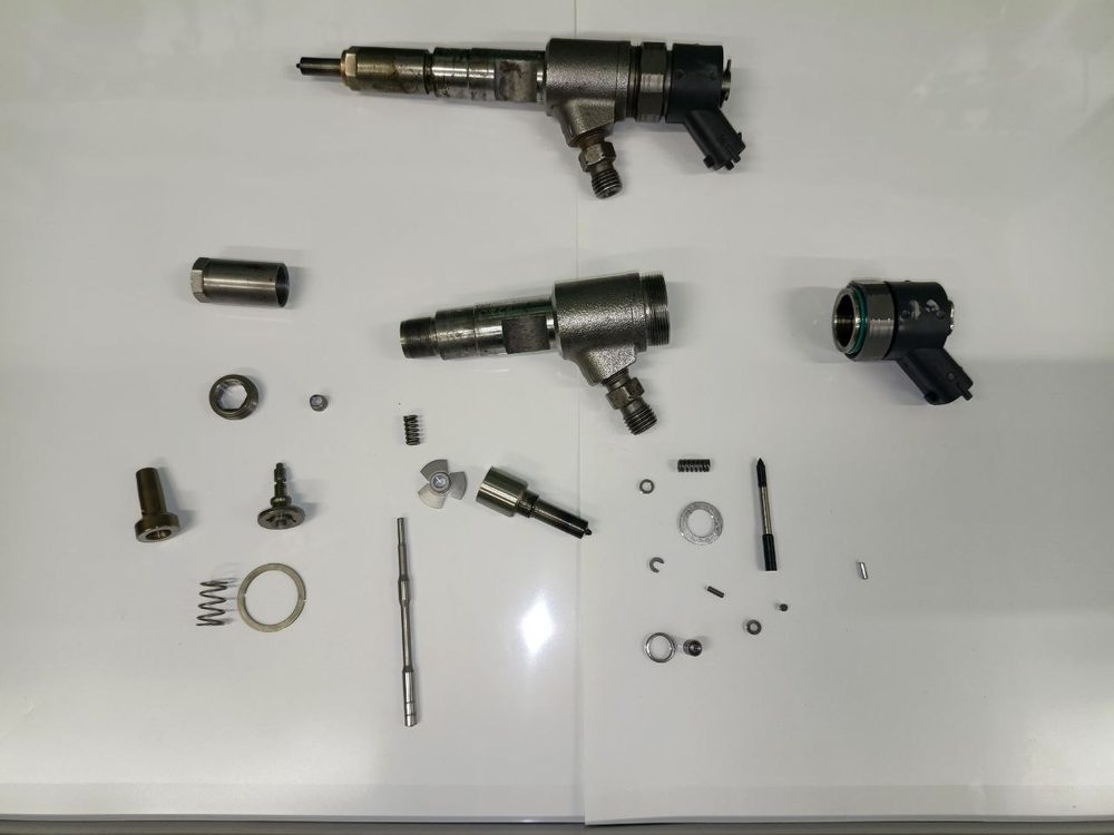 Форсунка Common Rail грузовика в полной разборке: распылитель, клапан, шток и пружины, ремонт форсунок в Ульяновске